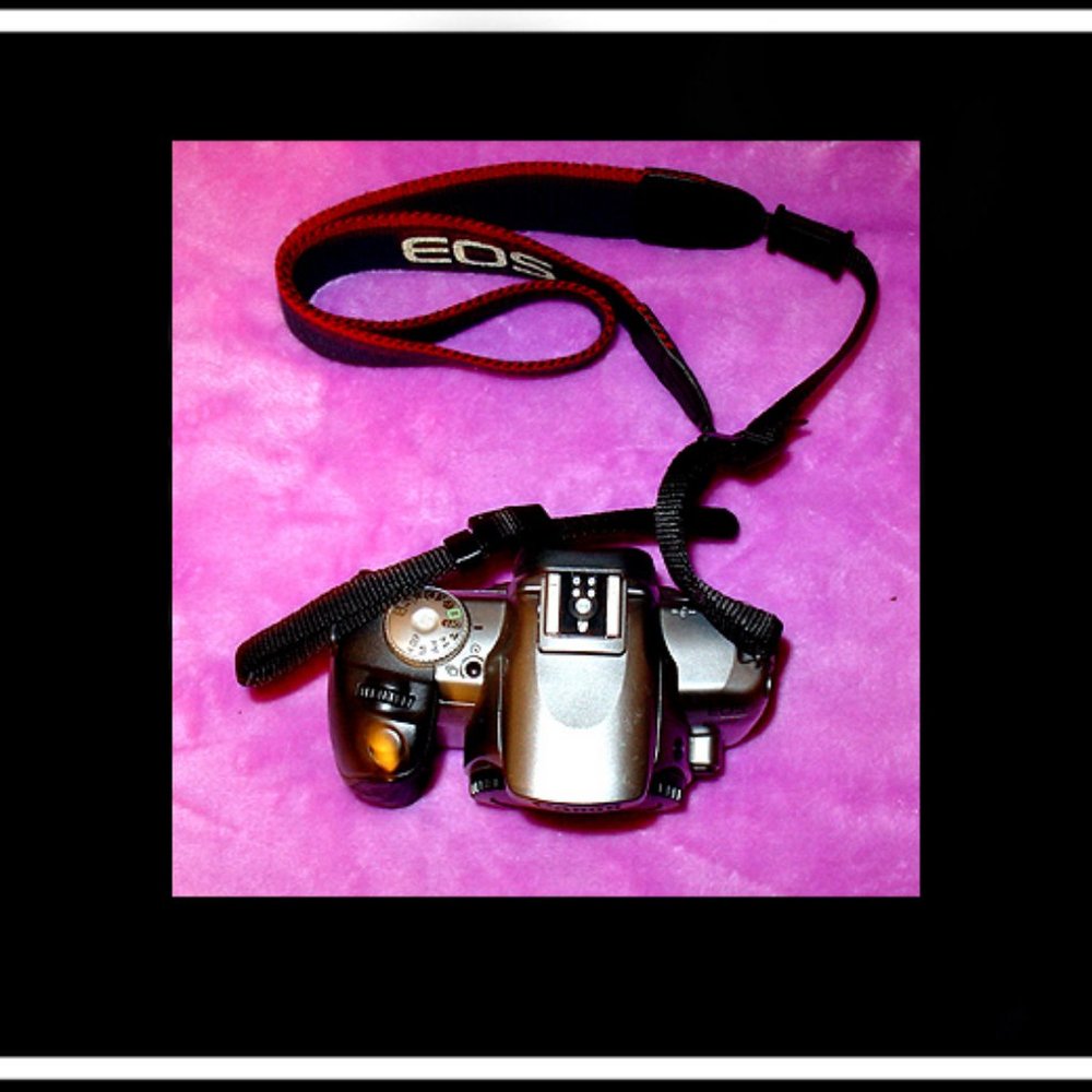 Canon Rebel EOS T2 Photography Camera With An Original Canon Camera Strap